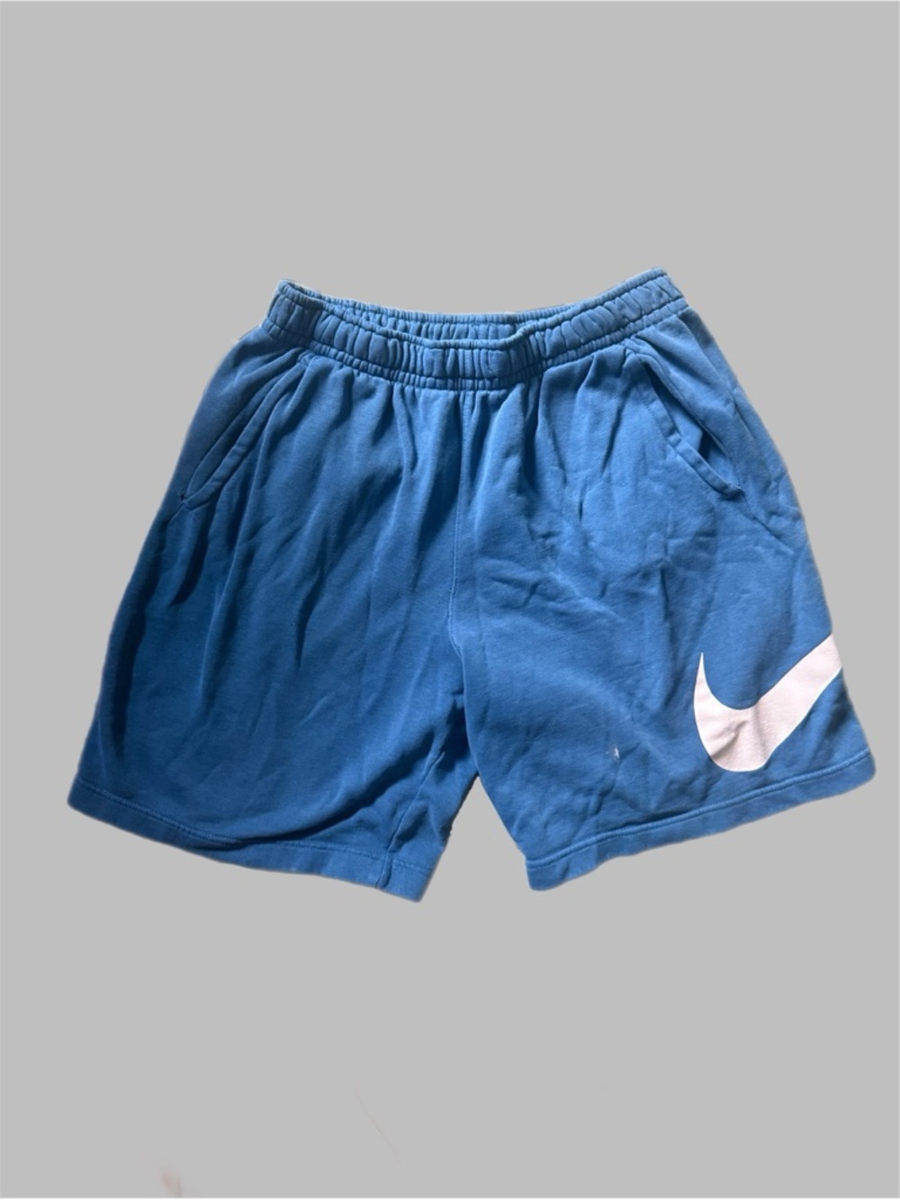 Nike Men's Blue Athletic Shorts with White Swoosh